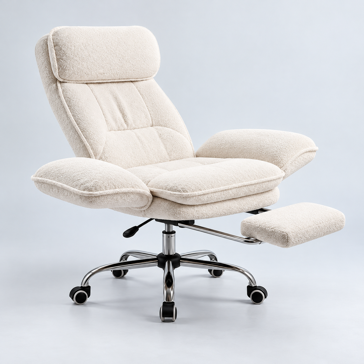 CloudyNest chair with arms folded down and footrest extended